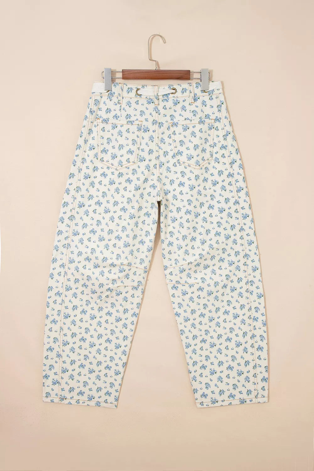 Grommet Knot Waist Floral Barrel Leg Jeans, model styling view