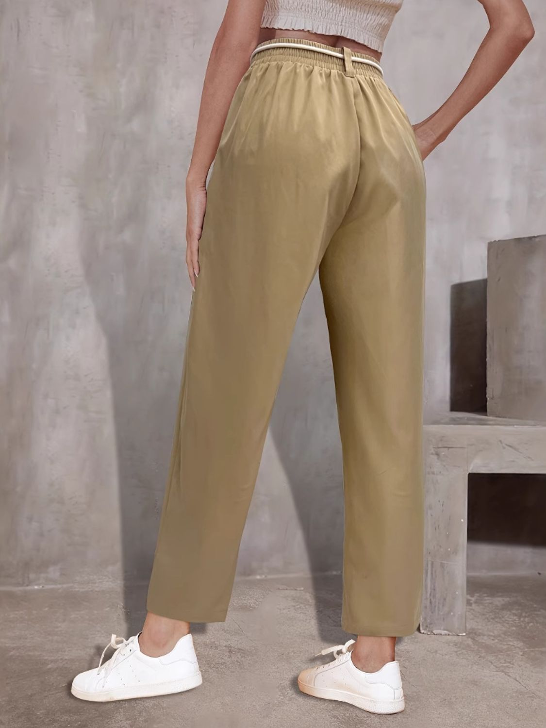 Khaki drawstring waist wide-leg trousers with a belted detail.
