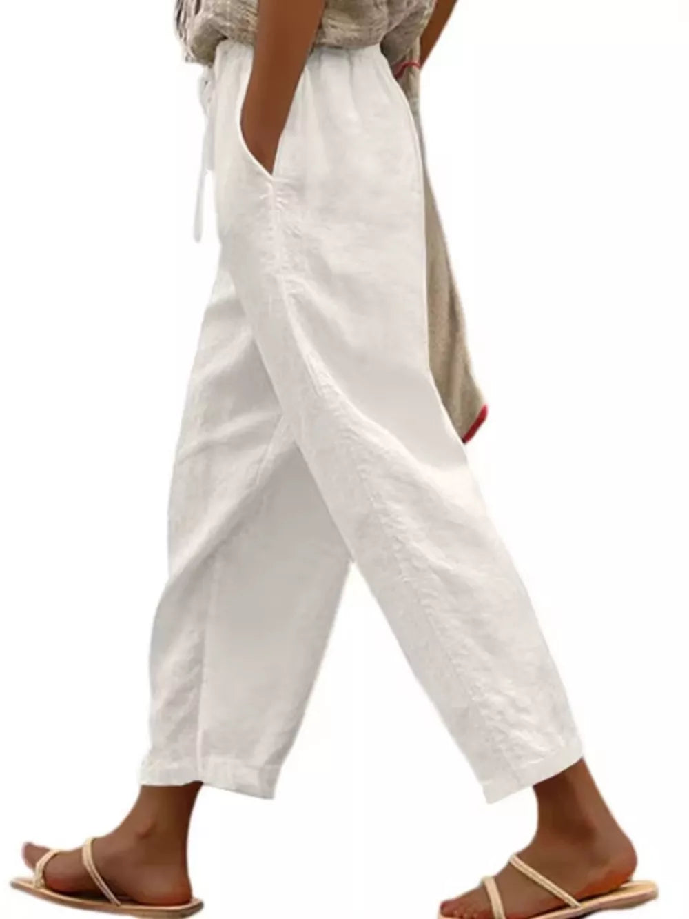 White relaxed fit cropped maternity pants with drawstring waist and pockets