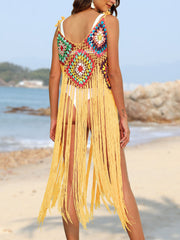 Yellow crochet patchwork cover-up dress with multicolor squares and long fringe detail.