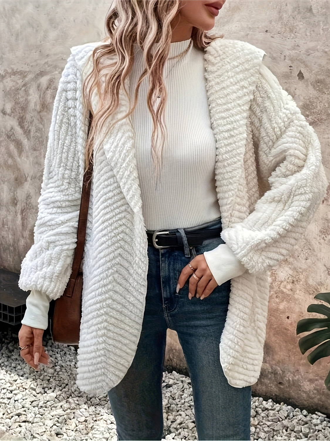Textured ivory hooded cocoon coat with chevron pattern, open front, and cozy fleece material.