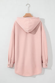 Blush pink waffle knit shacket with plaid trim and hood.