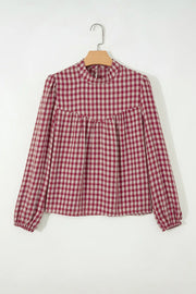 Country plaid long sleeve blouse with mock neck and keyhole detail.