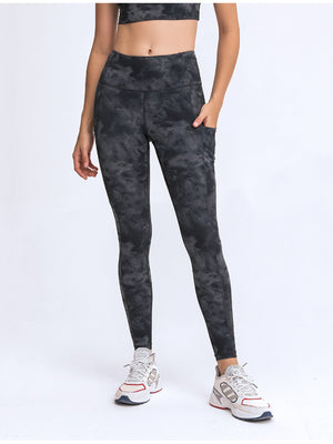 Black tie-dye sculpt leggings with performance pockets and a high waist.