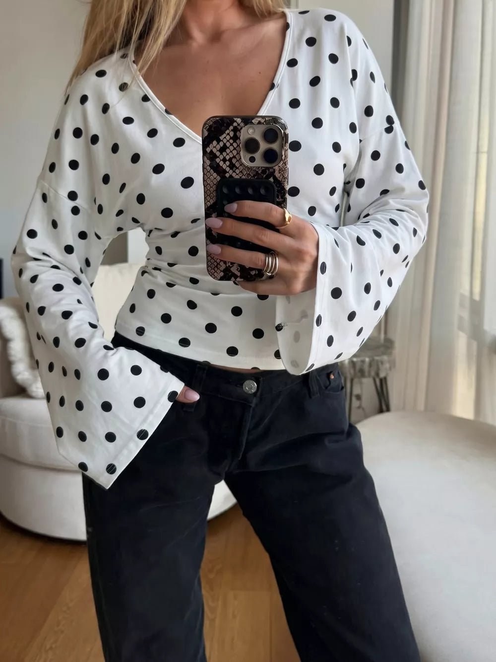 Polka Dot V-neck Long Sleeve T-shirt in Black, close-up detail