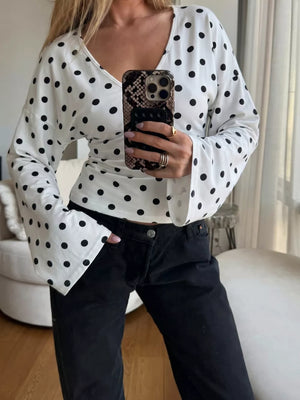 Polka Dot V-neck Long Sleeve T-shirt in Black, close-up detail