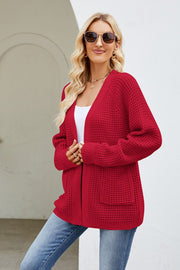 Deep Red waffle knit cardigan with patch pockets and open front.