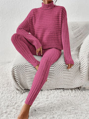 Textured turtleneck loungewear set in hot pink with ribbed detail.