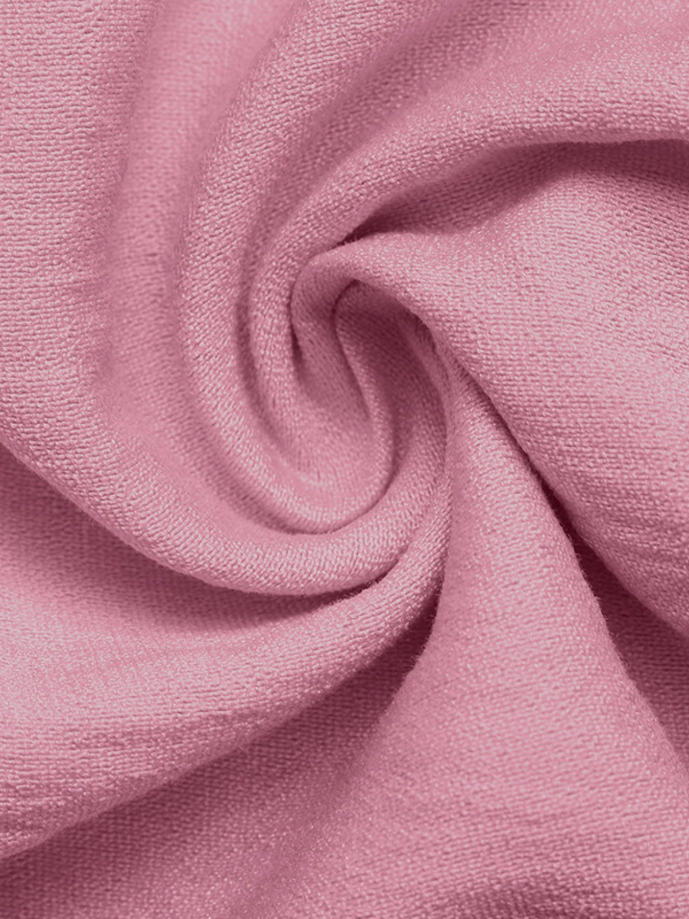 Pink maternity wrap romper fabric detail with textured weave.
