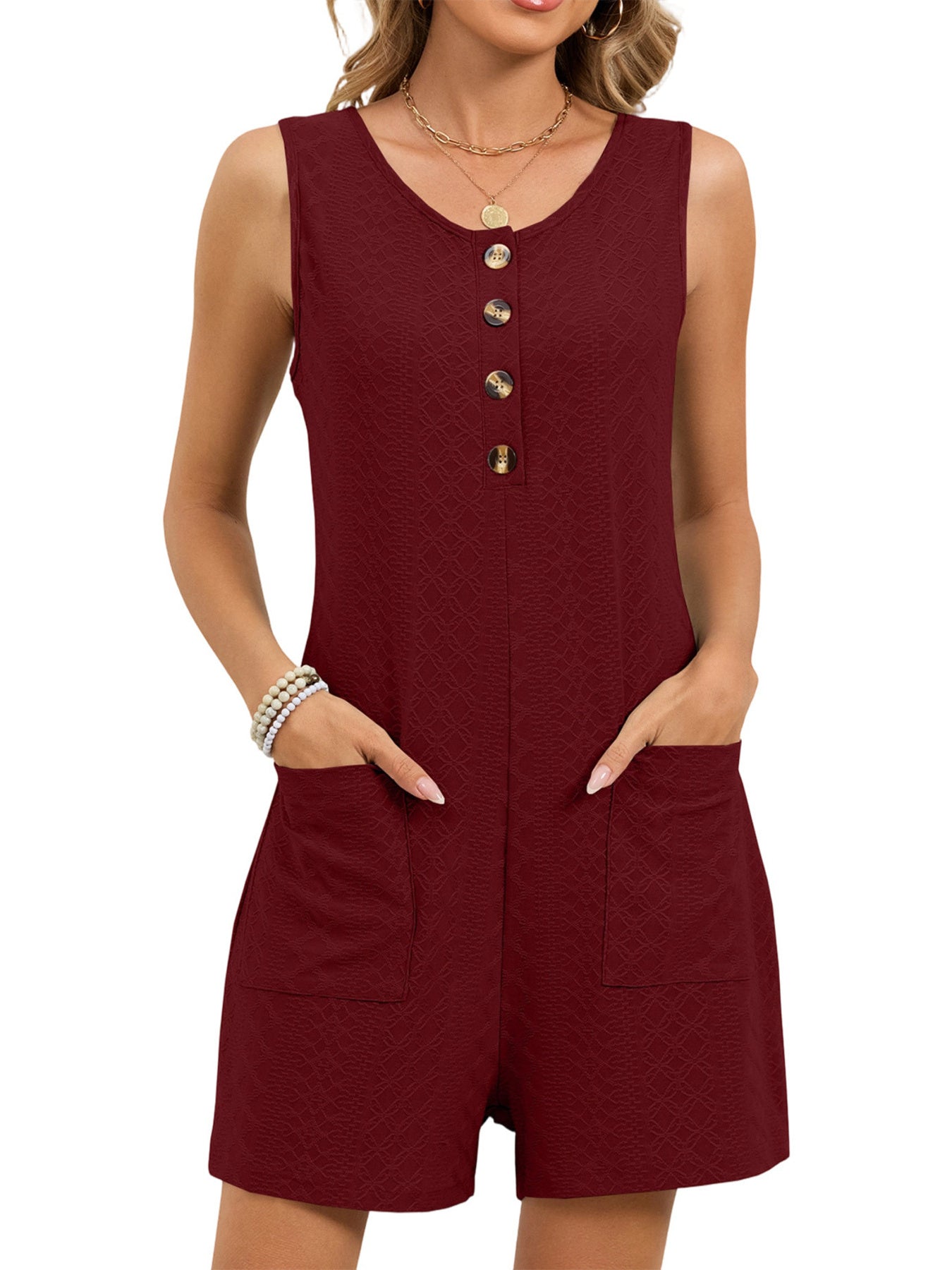 Burgundy sleeveless romper with button front and patch pockets
