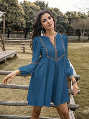 Blue V-neck balloon sleeve dress with embroidered neckline detail
