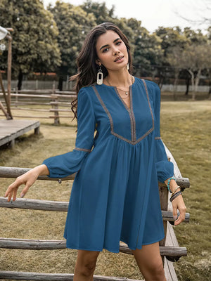 Blue V-neck balloon sleeve dress with embroidered neckline detail