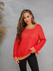 Chevron knit crewneck sweater in red and caramel with a fuzzy texture.