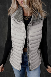Gray quilted puffer vest with a soft fleece collar and zipper closure.