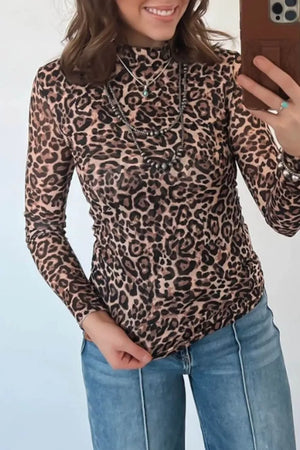 Leopard print high neck slim shirt with long sleeves and ruched sides.