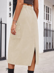 Tan denim midi skirt with side slit and cargo pocket