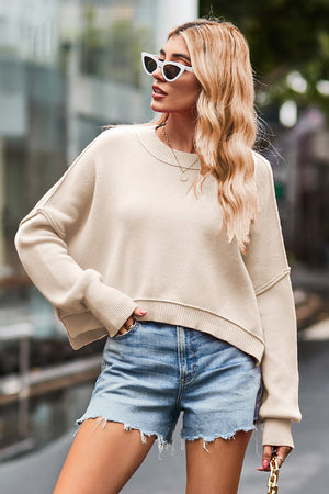 Cropped ribbed knit sweater in caramel with batwing sleeves and crew neck.