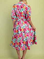 Floral V-neck midi dress with smocked waist and puff sleeves in cotton.