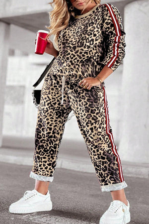 Leopard print joggers with sporty side stripes and drawstring waist.
