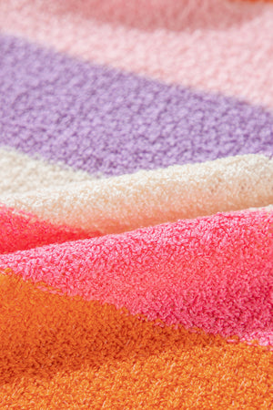 Colorblock knit hoodie with horizontal stripes in pink, purple, cream, and orange.