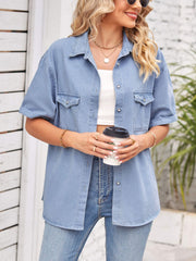 Relaxed light denim shirt jacket with cuffed sleeves and buttoned chest pockets.