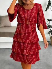 Red floral tiered ruffle hem dress with split sleeves and above-knee length.