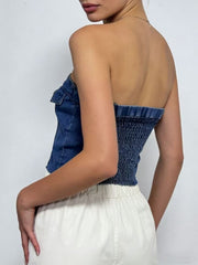 Blue denim strapless top with smocked back and flap pocket detail