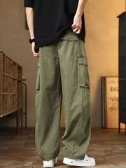 Men's green cargo pants with multiple pockets and drawstring detail