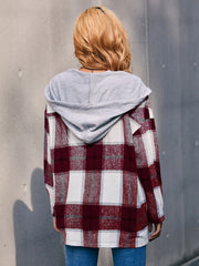 Oversized burgundy plaid shacket with grey hood, casual long sleeve outerwear.