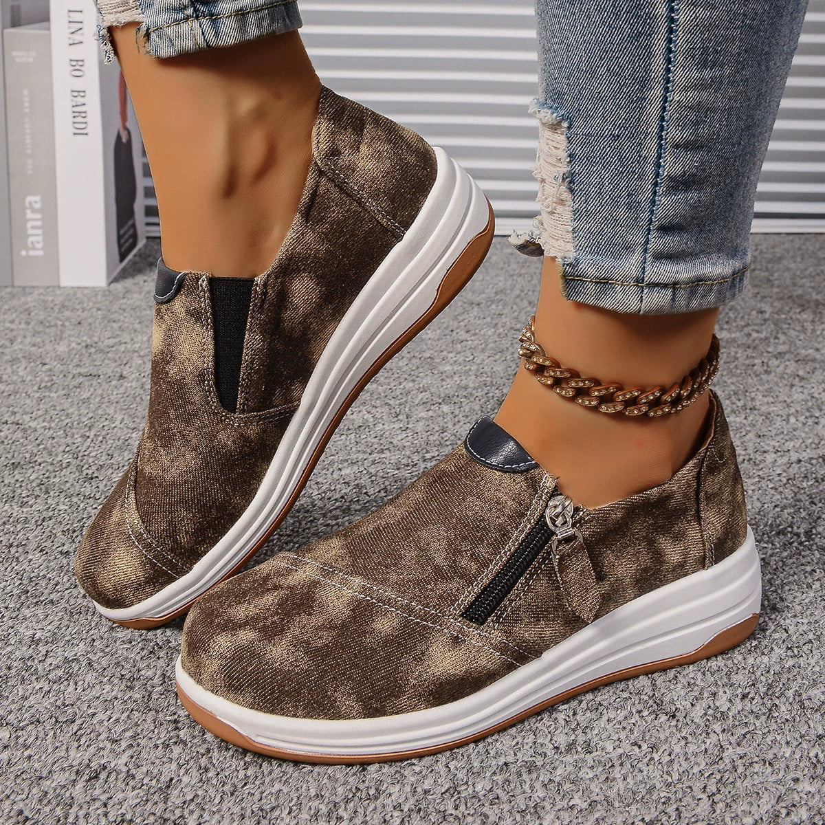 Brown tie-dye casual slip-on sneakers with side zipper and chunky sole.