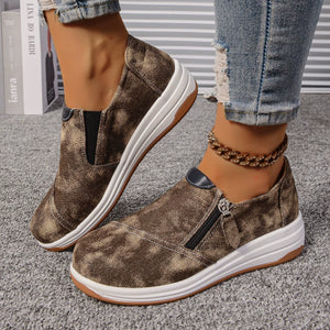 Brown tie-dye casual slip-on sneakers with side zipper and chunky sole.
