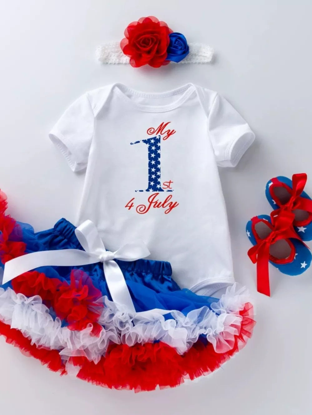 Patriotic baby outfit set with 4th of July graphic bodysuit and ruffled tutu.
