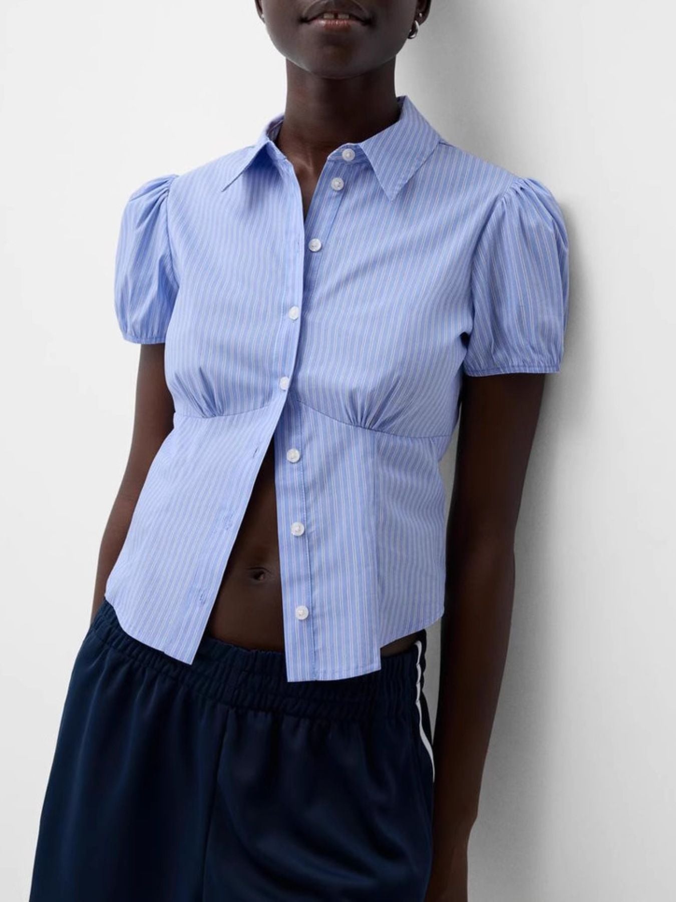 Light blue striped maternity shirt with puff sleeves and gathered waist
