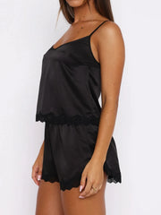 Black satin camisole and shorts set with lace trim