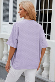 Lavender open-front crochet kimono sleeve top with allover circular pattern.