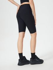 Black ribbed contour cycling shorts with ruched detail on the back.