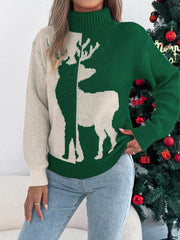 Green and cream knit turtleneck sweater with reindeer graphic, long sleeves, and ribbed trim.