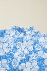 Tropical floral print blouse with frill neckline in blue and white polyester