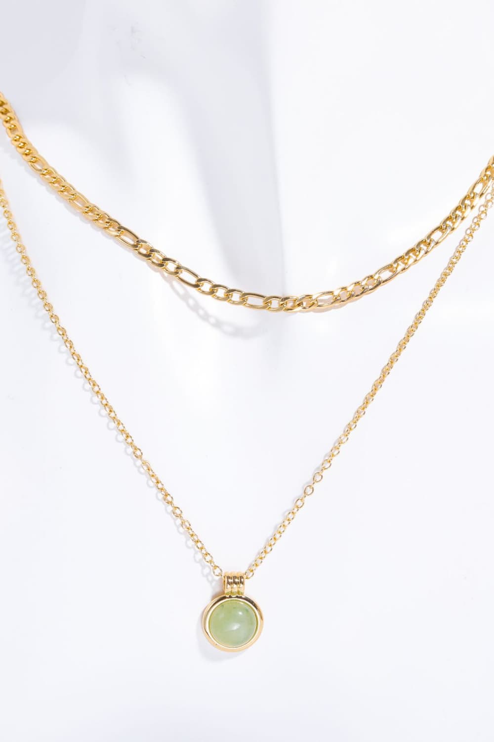 Gold layered necklace with green aventurine orb pendant