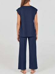 Dark Blue seamed knit wide-leg co-ord set with cap sleeves and pleated pants.