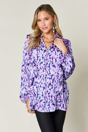 Blue purple ethereal print ruffle front blouse with balloon sleeves.