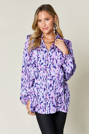 Blue purple ethereal print ruffle front blouse with balloon sleeves.