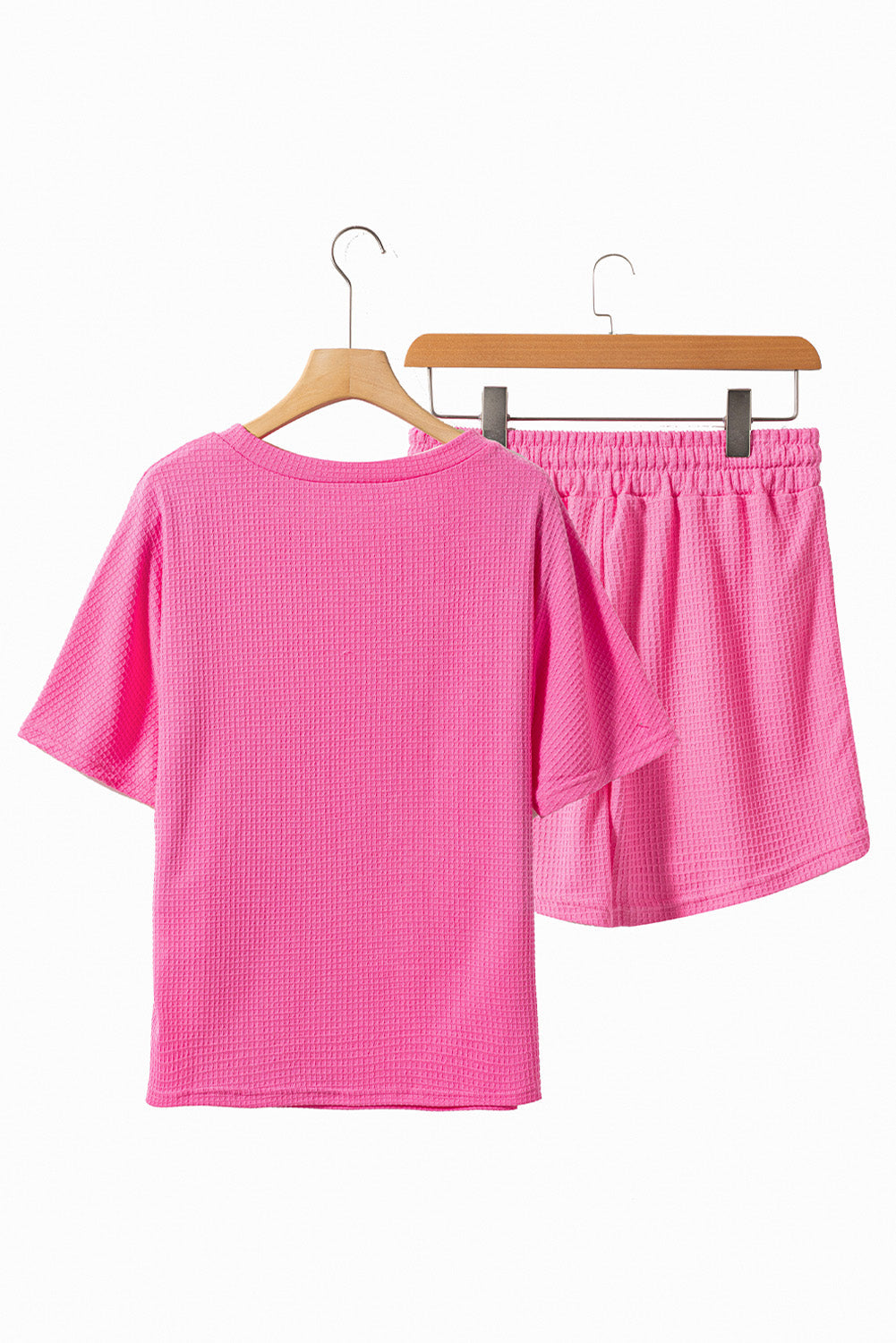Cerise waffle knit lounge set with short sleeves and elastic waist shorts.
