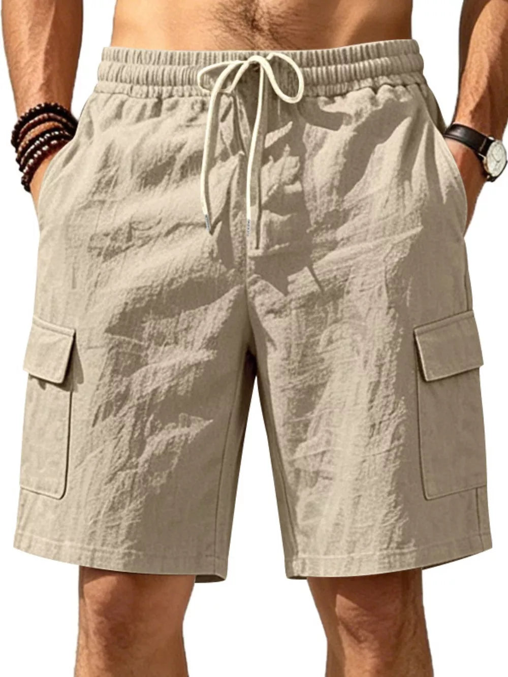 Apricot cargo shorts with drawstring waist and crinkled texture.
