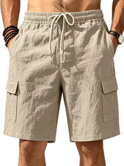 Apricot cargo shorts with drawstring waist and crinkled texture.