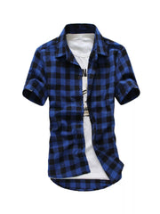 Men's short sleeve button-down shirt in Lake Blue buffalo check, layered over a white tee.