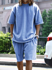 Sky blue relaxed fit men's two-piece set with drawstring shorts and short sleeve t-shirt.