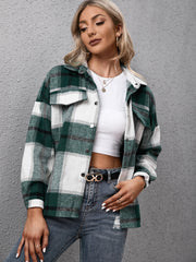 Oversized green plaid button-up shirt with chest pockets and white accents.