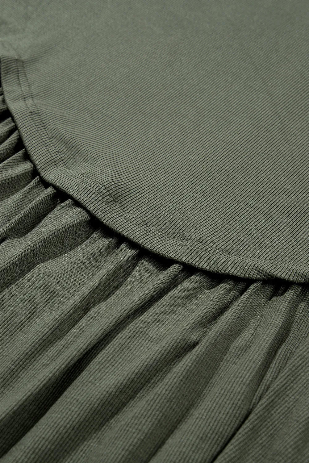 Moss ribbed peplum blouse with ruffled detail