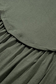 Moss ribbed peplum blouse with ruffled detail